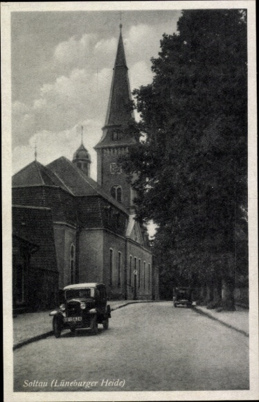 Postcard Soltau Lüneburg Heath Lower Saxony, church, street view, old cars, row of trees