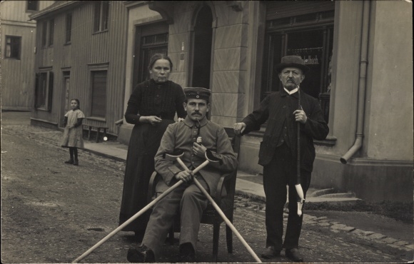Photo Postcard Buchholz in the Westerwald, German soldier with crutches