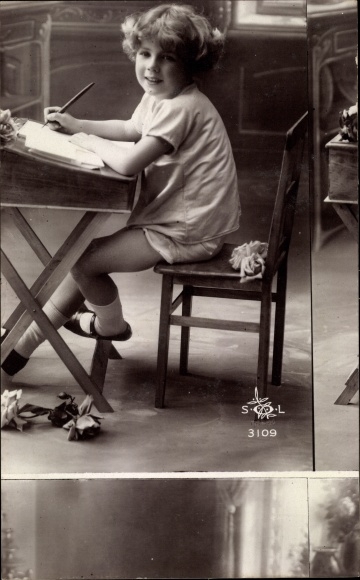 Postcard boy at the desk, misprint