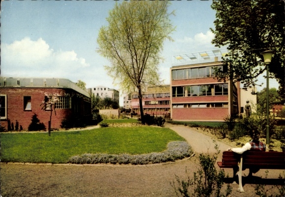 Postcard Viersen in North Rhine-Westphalia, modern building, garden, trees, park bench, sky, quiet...