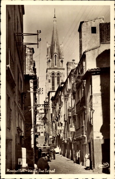 PC Montpellier Hérault, city view, old street, church, cars, people