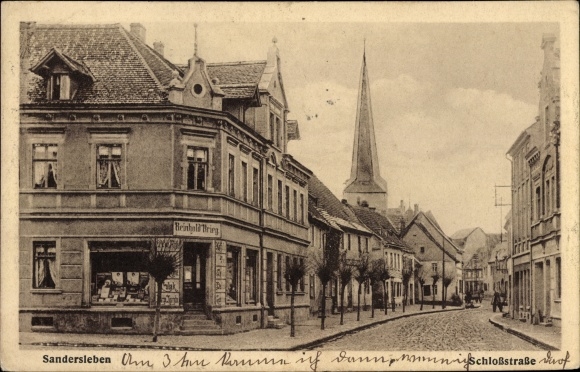 Ak Sandersleben in Anhalt, Schlossstrasse, kerktoren, winkel Reinhold Brieg