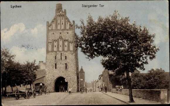 Postcard Lychen in der Uckermark, Stargader Tor, street scene, horse-drawn carriages