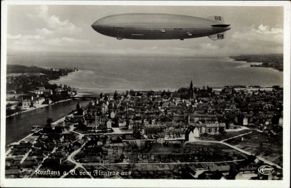 Ak Konstanz am Bodensee, Fliegeraufnahme, Zeppelin über der Stadt