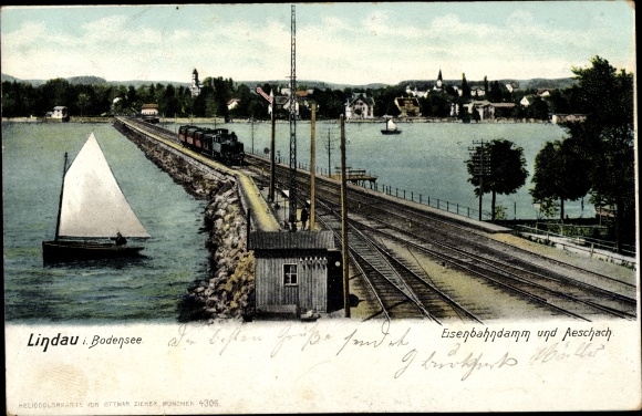 PC Lindau on Lake Constance Swabia, railway embankment and Aeschach, steam locomotive, sailing boat