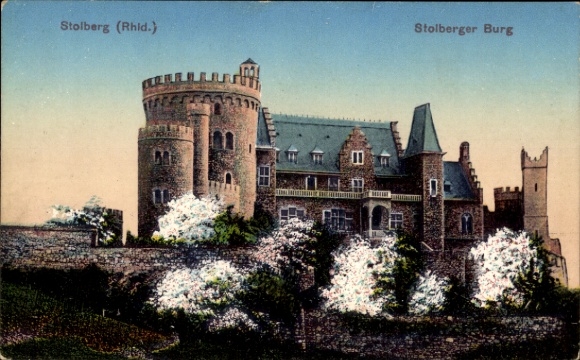 Postcard Stolberg in the Rhineland, Stolberg Castle, medieval style, flowering trees in the foreground