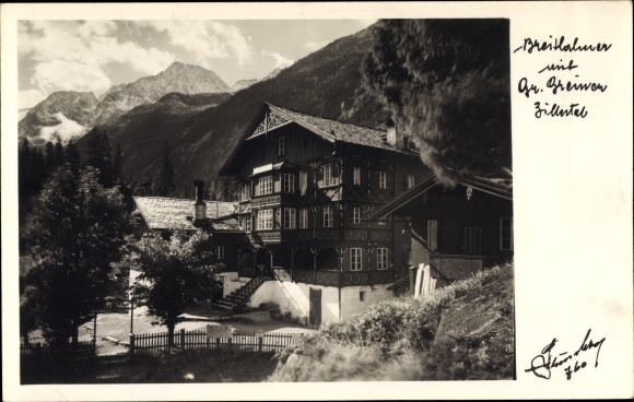 Postcard Ginzling in Tirol, Gasthof Breithahner with Großer Greiner