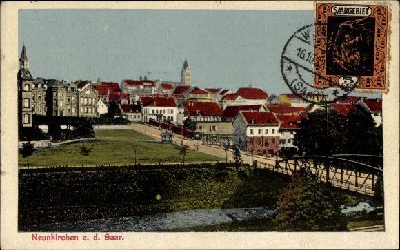 Postcard Neunkirchen in Saarland, city panorama, river section, bridge