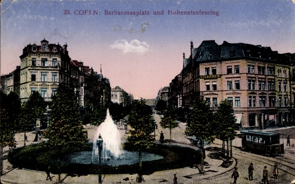 Ak Ehrenfeld Köln am Rhein, Barbarossaplatz, Hohenstaufenring, Brunnen, Gebäude, Straßenbahn