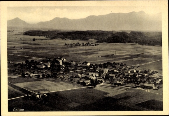 Postcard Götting Bruckmühl in Upper Bavaria, aerial view of rural landscape, mountains in the background