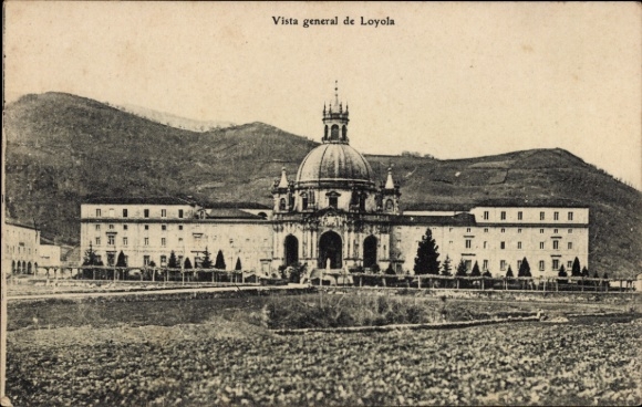 Postcard Loyola Basque Country Spain, view of the building with mountain landscape in the background