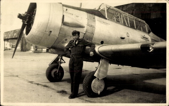 Photo of a pilot at an airplane, airport, year 1948