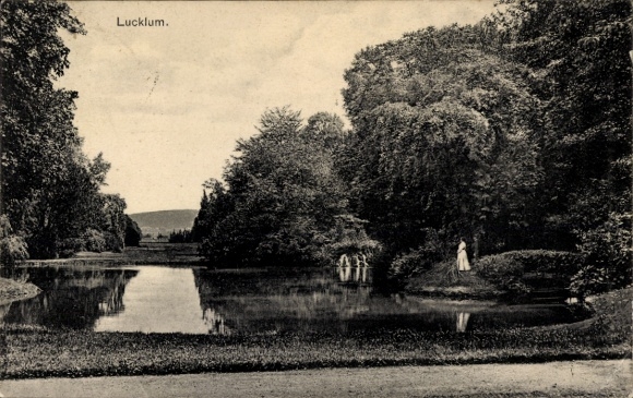 Postcard Lucklum Erkerode Lower Saxony, landscape with pond, trees, woman in white dress, quiet scene