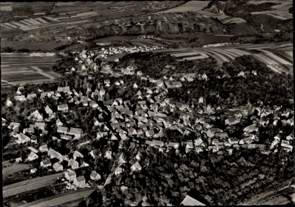 Postcard Erdmannhausen in Württemberg, aerial view of many roofs, surrounding fields