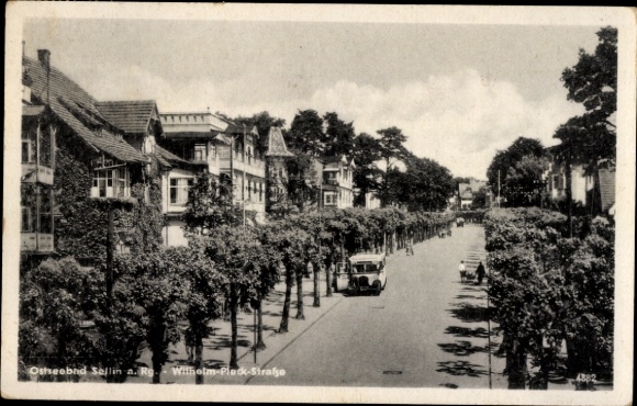 Ak Ostseebad Sellin op Rügen, Wilhelm Pieckstraat, villa's, bus