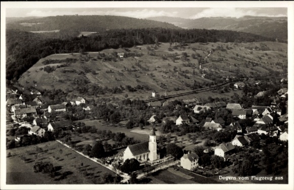 Postcard Dogern am Rhein, aerial view of church, houses, landscape, green hills