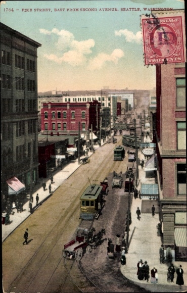 Ak Seattle Washington USA, Blick auf Pike Street,  Gebäude, Straßenbahn, Menschen, Fahrzeuge