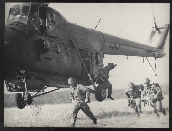Photography DDR NVA soldiers during a maneuver, helicopter
