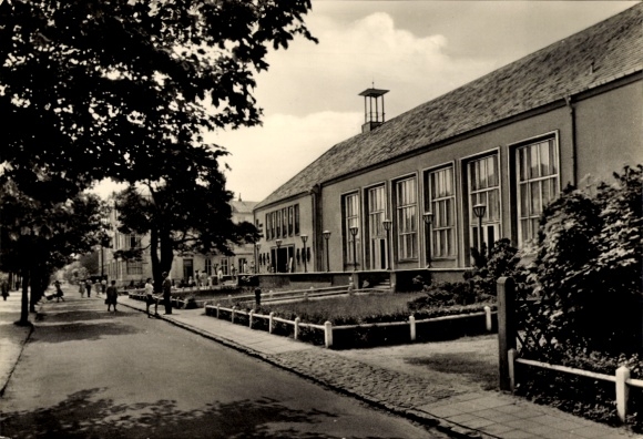 Postcard Ostseebad Ahlbeck on Usedom, House of Recreation, beautiful day, people on the street, trees...