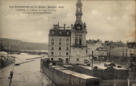 Ak Corbeil Essonne, Hochwasser der Seine im Januar 1910, Rathaus, Brücke, Bahnhof der Großen Mühlen