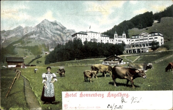 KP Engelberg Canton Obwalden Szwajcaria, Hotel Sonnenberg, krowy, górski krajobraz, kobieta w tradycyjnym stroju