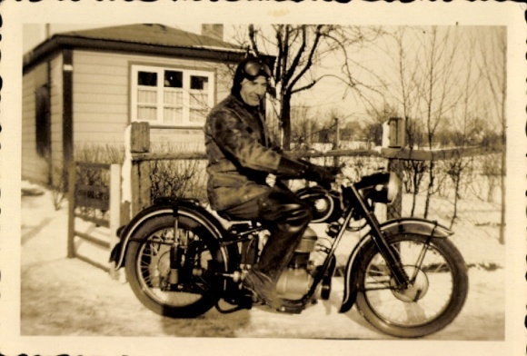 Photo man on a motorcycle, winter 1952, snow
