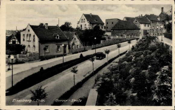 Postcard Eisenberg in Thuringia, Geraer-Straße, houses, street, car