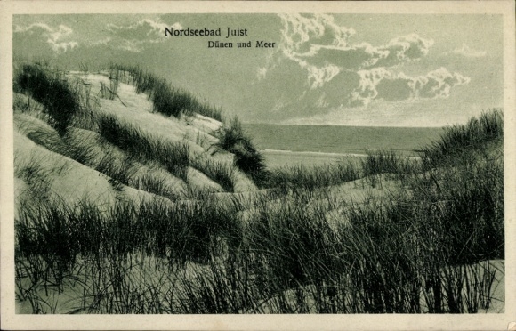 Postcard North Sea resort Juist in East Frisia, dunes and sea, North Sea resort landscape with grass and sky