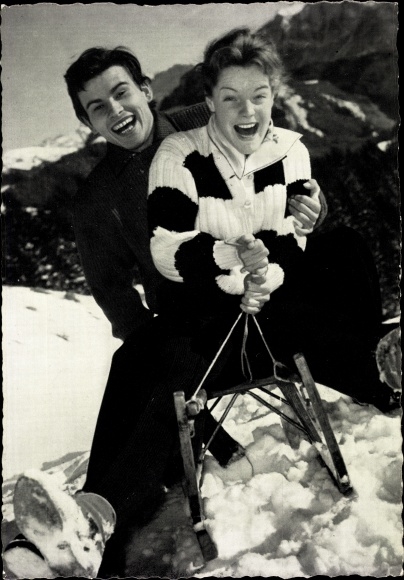 Postcard actress Romy Schneider, actor Horst Buchholz, sledge