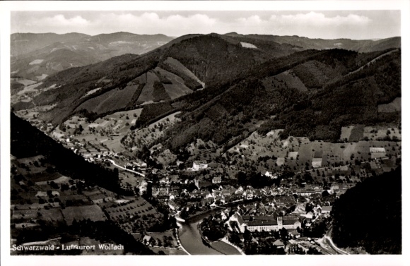 Postcard Wolfach in the Black Forest, aerial view of the Black Forest, town and river, mountains in the background