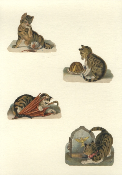 4 koty z opłatka, każdy o wymiarach ok. 6,5 x 8,5 cm