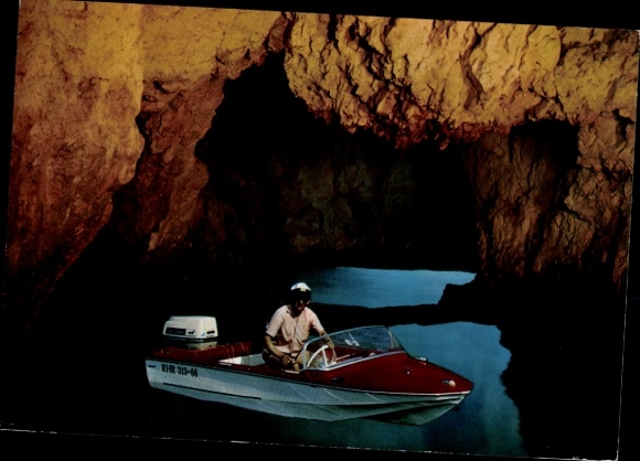 Postcard Man in Motorboat, Grotto