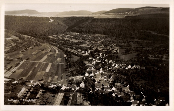 Ak Talheim Mössingen in Württemberg, luchtfoto van landelijke omgeving, heuvels, bossen, woongebouwen