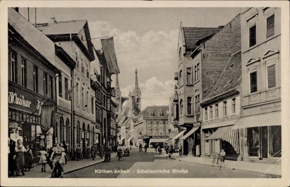 Ak Köthen in Anhalt, Schalaunische Straße, Geschäfte, Passanten