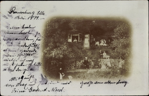Photo Postcard Lauenburg an der Elbe, people in a garden, woman with a watering can