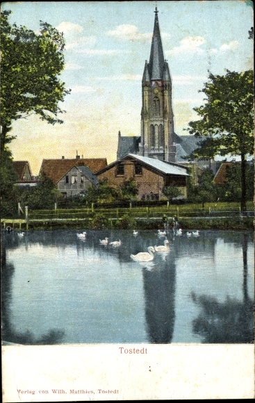 Postcard Tostedt in Lower Saxony, view over a pond to the church