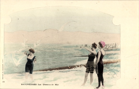 Postcard beach, three women in swimwear, seagulls