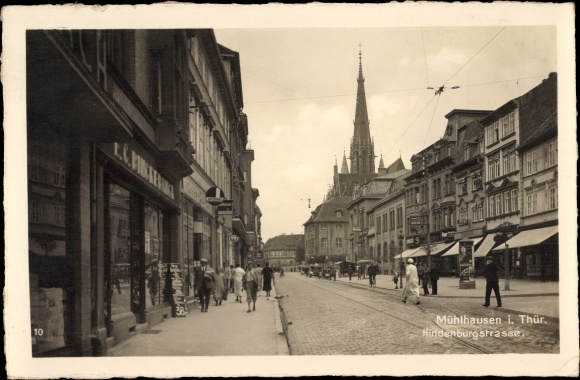 Photo Postcard Mühlhausen Thüringen, The Hindenburgstraße with shops