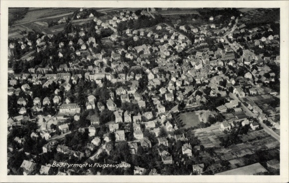 Postcard Bad Pyrmont in Lower Saxony, aerial view of numerous houses, no people visible