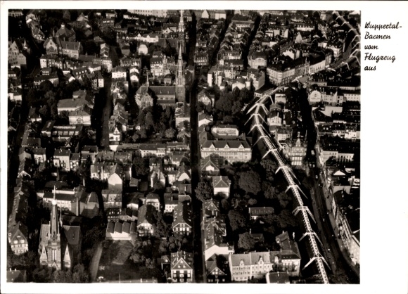 Postcard Wuppertal, aerial view of cityscape, banner with text