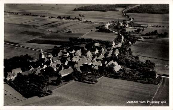 Postcard Riedbach in Lower Franconia, aerial view of rural surroundings, church visible