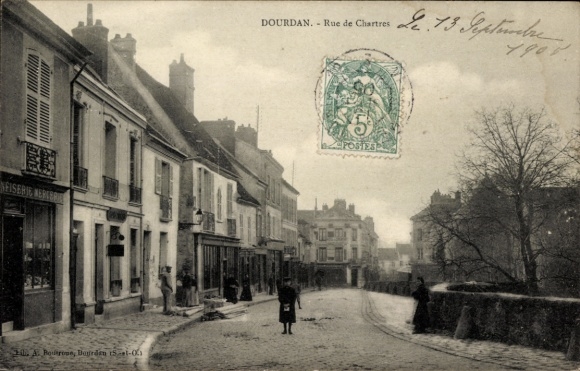 Ak Dourdan Essonne, Straße, Häuser, Markt, Poststempel, Personen,  Szene