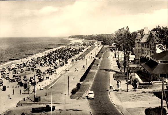 Postcard Ostseebad Kühlungsborn, beach, promenade, buildings, clouds, cars, parasols