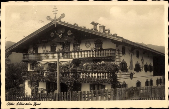 Postcard Schliersee in Upper Bavaria, Old Schliersee House, traditional architecture, balcony with flowers