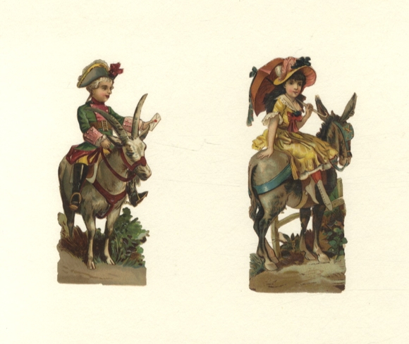 2 wafers boy riding on a billy goat, girl riding on a donkey, each approx. 12.5 x 5.5 cm