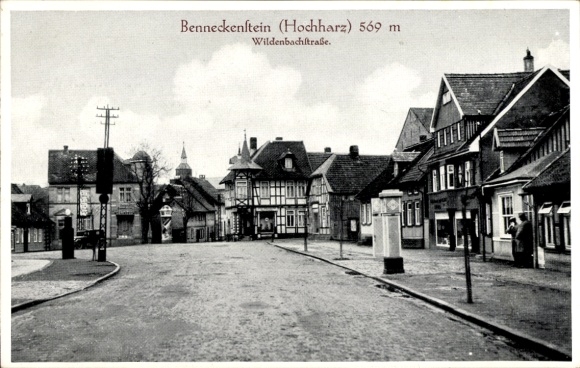 Postcard Benneckenstein Oberharz, street, houses, clouds, town sign, Wildenbachstraße