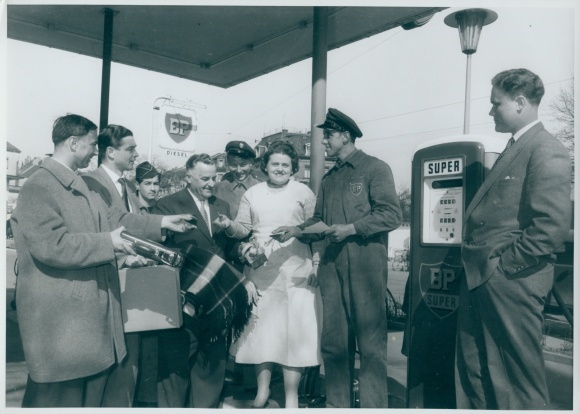 Photo People at a BP gas station, gas station attendant, gas pump