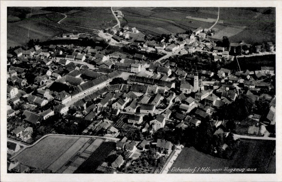 Postcard Eichendorf in Lower Bavaria, aerial photograph, many buildings, streets, fields, view