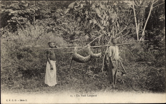 Postcard Un Petit Leopard, African hunters with their prey