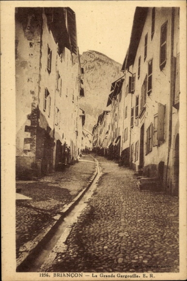 Postcard Briançon Briancon Hautes-Alpes, street with stones, old houses, mountain in the background, sepia